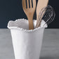 The Beatriz Ball Vida Alegria Melamine Utensil Holder holds a wooden spoon, spatula, and metal whisk on a gray surface—perfect for adding stylish flair to your countertop.