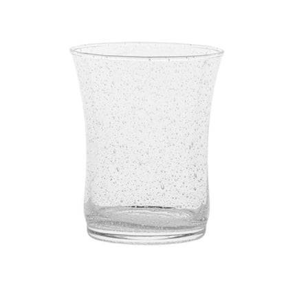 The Juliska Provence Basil Drinkware Collection features clear glasses with a slightly flared rim and bubble-like texture, inspired by Provence and classic mouth-blown Juliska tumblers.