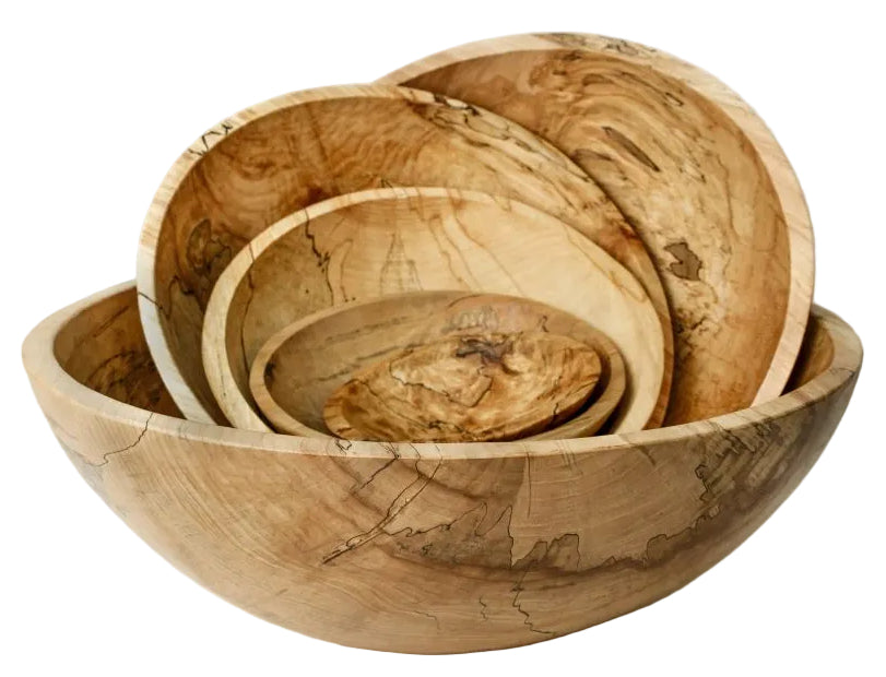 The Peterman's Spalted Maple Serving Bowl Collection features five nested bowls of different sizes, each highlighting unique grain patterns and the natural beauty of spalted maple wood.