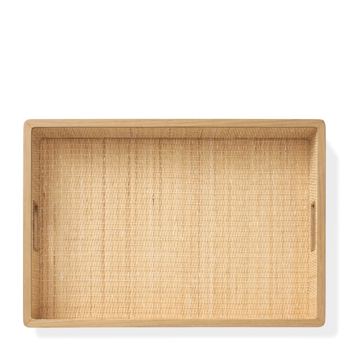 The Colette Cane Tray by Aerin features a woven rattan base, white oak trim, and two side handles, displayed from above against a white background.
