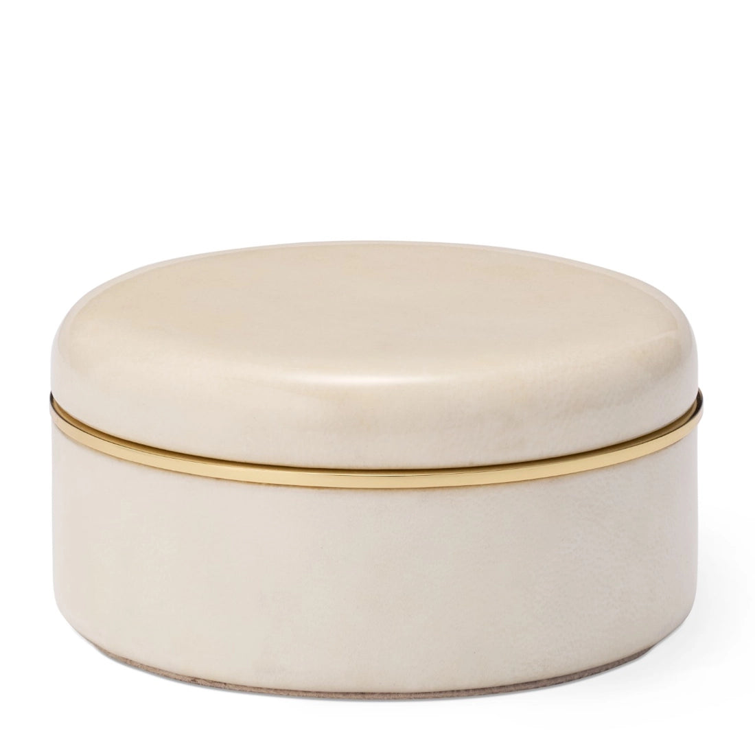 The Livio Parchment Coaster Set by Aerin features a round, cream-colored box with a smooth lid, thin gold band, and subtle Art Deco-inspired brass detailing separating the lid from the base.