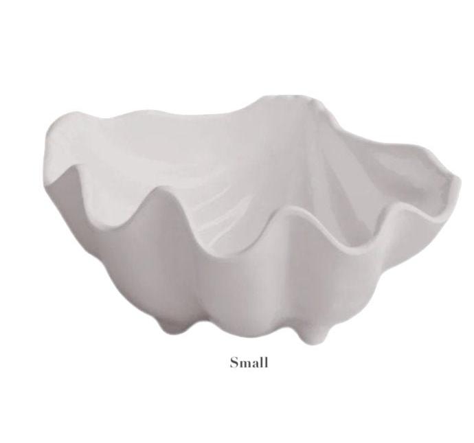 The Vida Ocean Shell Bowl Collection by Beatriz Ball features a stylish white bowl with a wavy, clam shell-inspired edge. Made from luxury melamine, it is dishwasher safe. The word "Small" appears below the bowl.
