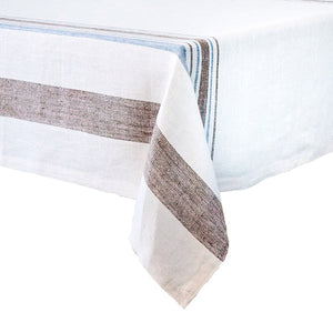 The Juliska Danish Stripe Table Linen Collection features wide brown and blue stripes, blending minimalist elegance with classic Scandinavian design.