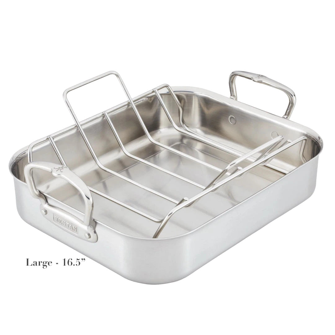 The Hestan Provisions Classic Clad Roaster with Rack Collection features tri-ply construction, a removable rack, two large handles, and measures 16.5 inches; shown on a white background.