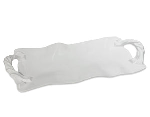 The Beatriz Ball Vida Sasha Serveware Collection features a rectangular white ceramic serving platter with twisted handles and a wavy edge—ideal for outdoor entertaining.