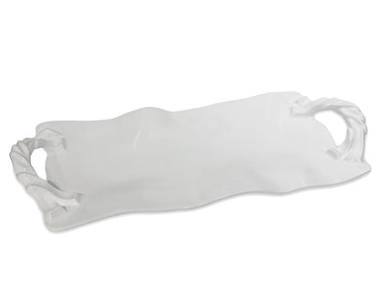 The Beatriz Ball Vida Sasha Serveware Collection features a rectangular white ceramic serving platter with twisted handles and a wavy edge—ideal for outdoor entertaining.