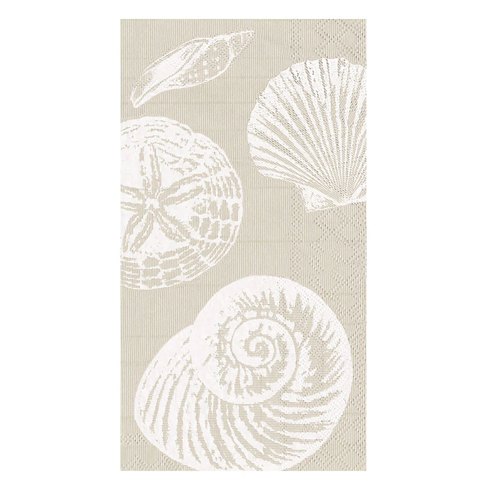 The Shells Collection by Caspari features a beige, triple-ply rectangular napkin decorated with white seashell illustrations—an eco-friendly choice ideal for coastal gatherings.