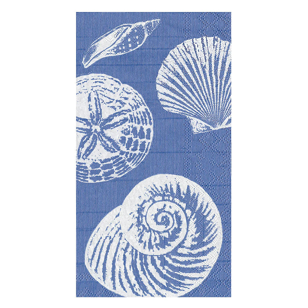The Shells Collection by Caspari features blue rectangular fabric with white seashell and starfish illustrations, creating eco-friendly napkins that bring coastal charm to your table.