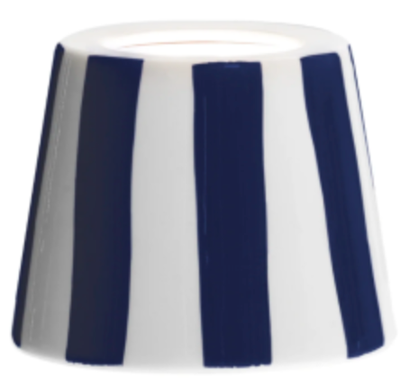 The Poldina Lido Shade Collection by Zafferano America features a handmade white ceramic shade with vertical blue stripes and a truncated cone shape.