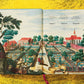 A page from "The Book of Citrus" by Taschen features a garden similar to Italian villas, with pathways, trees, and structures on a yellow backdrop. The scene boasts intricate illustrations resembling finely etched copper plates.
