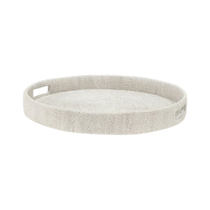 The Monarch Round Tray Collection by PALECEK features a round beige woven tray with raised edges and two side handles, crafted from seagrass rope.