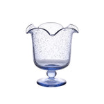 The Juliska Provence Vase by Juliska features clear blue mouth-blown glass, a flared wavy rim, and bubble-like texture on a round base—perfect as a whimsical centerpiece against a white background.