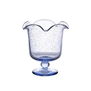 The Juliska Provence Vase by Juliska features clear blue mouth-blown glass, a flared wavy rim, and bubble-like texture on a round base—perfect as a whimsical centerpiece against a white background.