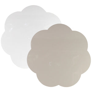 Two placemats from the Addison Ross Scalloped Lacquer Placemat Collection, one white and one beige, with flower-shaped scalloped edges and a subtle velvet embossed texture, are placed side by side on a plain background.