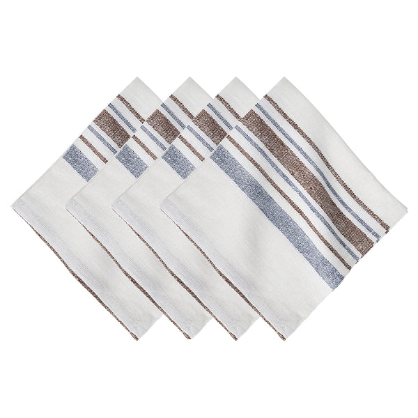 The Danish Stripe Table Linen Collection by Juliska features white napkins with blue and brown stripes, showcasing minimalist Scandinavian-inspired elegance.