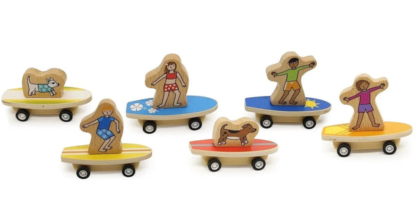 A collection of eco-friendly Jack Rabbit Creations bamboo figurines on wheels, each featuring a character involved in different summer activities such as skateboarding, surfing, and playing with a dog.