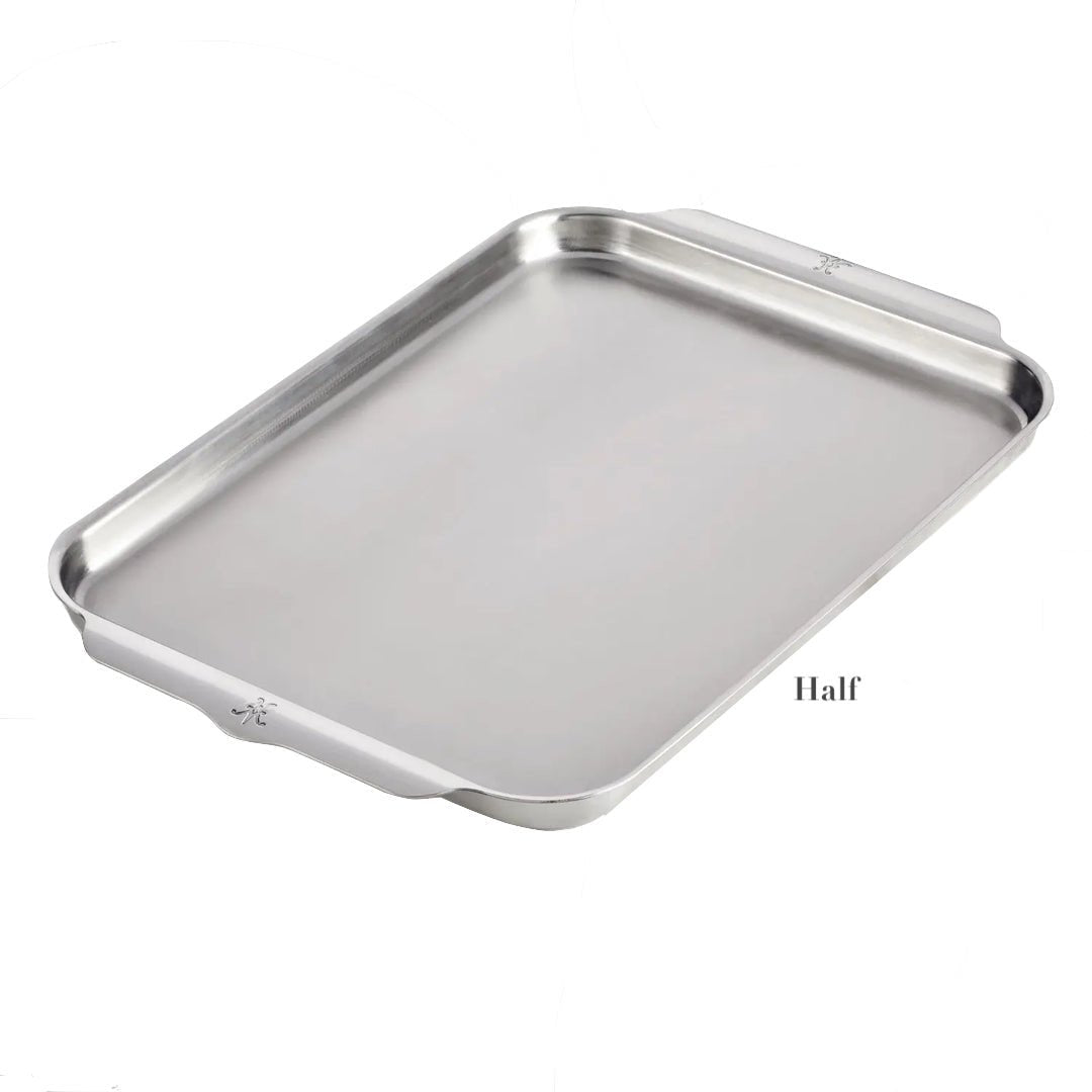 The Hestan Provisions OvenBond Sheet Pan Collection features half-size, triple-bonded clad stainless steel pans with raised edges and handles, oven safe up to 600°F for versatile, high-performance baking.