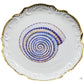 Anna Weatherley Shell Bread and Butter Plate Collection features hand-painted spiral seashells at the center and elegant gold-trimmed edges.