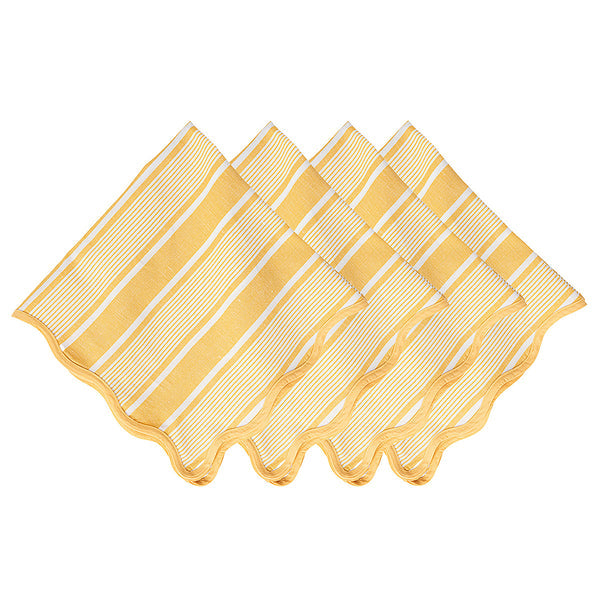 Four breezy linen napkins with white Cabana stripes from the Juliska Cabana Stripe Tabletop Collection are displayed in a row.