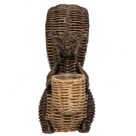 The Juliska Devon Willow Squirrel Flameless Candle Holder is a hand-woven sculpture that holds a basket, making it a charming decorative centerpiece for any space.