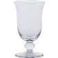 The Juliska Provence Basil Drinkware Collection features a textured glass goblet with a flared rim, round base, and decorative stem, inspired by Provence glasses and shown on a white background.