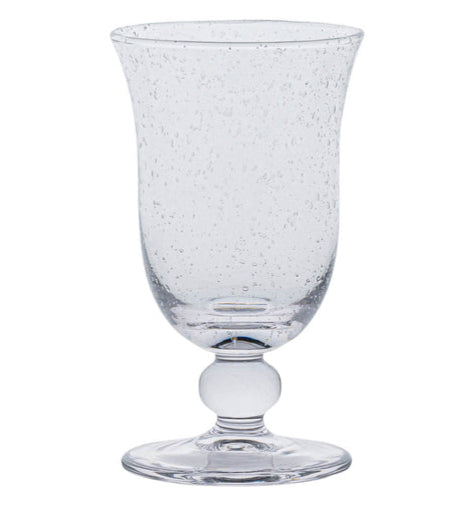 The Juliska Provence Basil Drinkware Collection features a textured glass goblet with a flared rim, round base, and decorative stem, inspired by Provence glasses and shown on a white background.