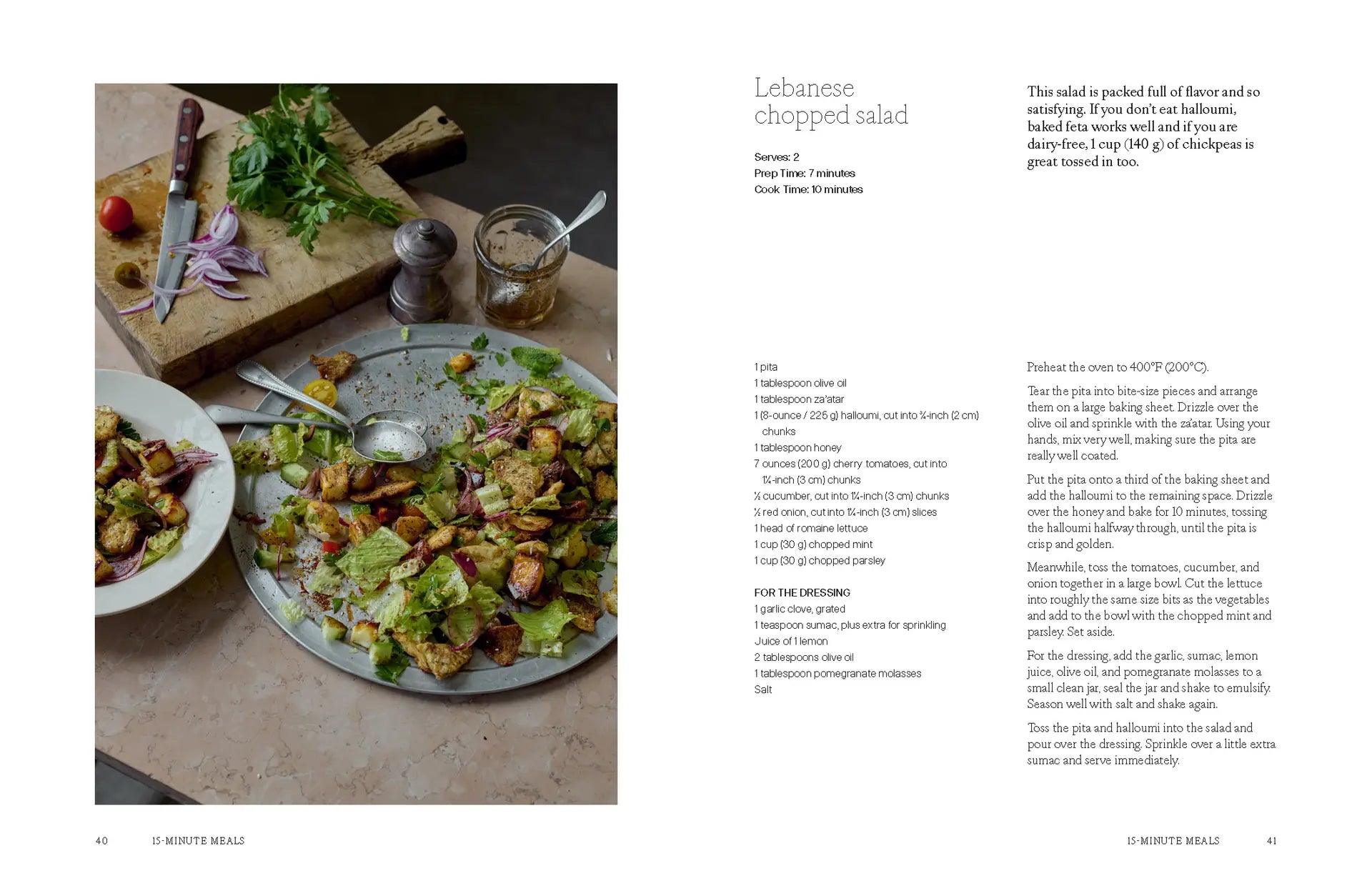 A plate of Lebanese chopped salad with herbs and onions rests on a cutting board beside a knife, set atop a marble surface—an ideal creation from A Meal For Two by Chronicle Books. The recipe’s ingredients and instructions appear on a page to the right, making this vibrant salad an excellent choice for quick 15-minute meals.
