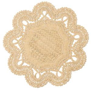 The Belladonna Placemat by Blue Pheasant is a round, beige crocheted piece featuring scalloped edges and intricate lacy patterns—ideal for adding elegance to your table setting.