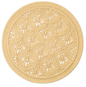The Cleo Placemat by Blue Pheasant is a round beige placemat with an intricate floral and geometric design, finished with elegant braided edges.