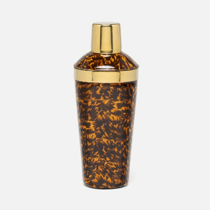 The Blue Pheasant Maximilian Bar Collection cocktail shaker features a gold-tone lid and band with a bold faux tortoise shell design, showcased against a plain white background.
