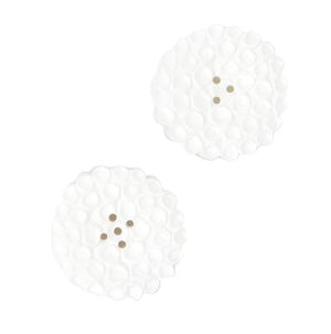 The Daphne Salt and Pepper Shaker Set by Blue Pheasant features two white, round porcelain shakers with a bubble-like, bamboo-inspired texture and four brown center dots, displayed on a plain white background.