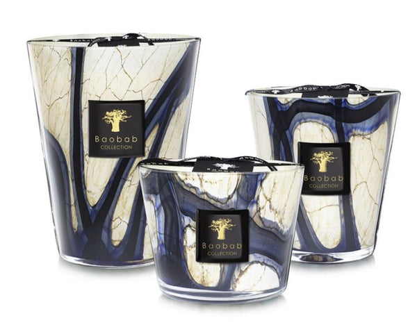 Three Baobab Collection Stones Lazuli Candles, featuring marbled white and blue glass containers in different sizes inspired by Lazuli Stones.