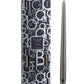 A tall, slender candlestick with a grey glaze stands beside a black and white patterned box labeled "Baobab Collection Candela Candlesticks" by Baobab.