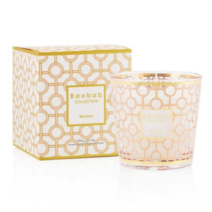 A Baobab Women Body Wellness Collection item by Baobab is displayed beside its coordinating box, featuring gold and white geometric patterns and exuding a floral scent.