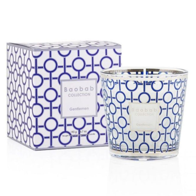 The Baobab Gentlemen Body Wellness Collection features a blue geometric pattern on white and offers a refined, masculine amber-inspired fragrance.