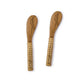 The Wood & Wicker Wrapped Serving Collection by Two's Company features two acacia butter knives with woven bamboo handles, adding rustic charm as unique serving pieces, shown side by side on a white background.