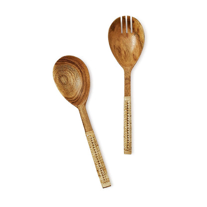 The Two's Company Wood & Wicker Wrapped Serving Collection features a solid spoon and a slotted spoon with patterned handles, displayed on a white background, adding rustic charm to your table.