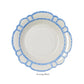 A white serving bowl from the Melamine Bamboo Dinnerware Collection by Two's Company features a decorative rim and scalloped edges. Shown from above on a plain background with the label "Serving Bowl" below.