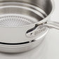 Close-up of the Hestan Provisions Stainless Steel Steamer Insert, 3qt, featuring a shiny triple-bonded construction, perforated design for steaming, and a handle engraved with "Hestan.