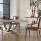 Modern dining room with a Century Furniture Omni Large Rectangular Dining Table in Blonde Cerused Oak, four leather chairs, a sideboard with lamps and decor, large artwork, and floor-to-ceiling windows.