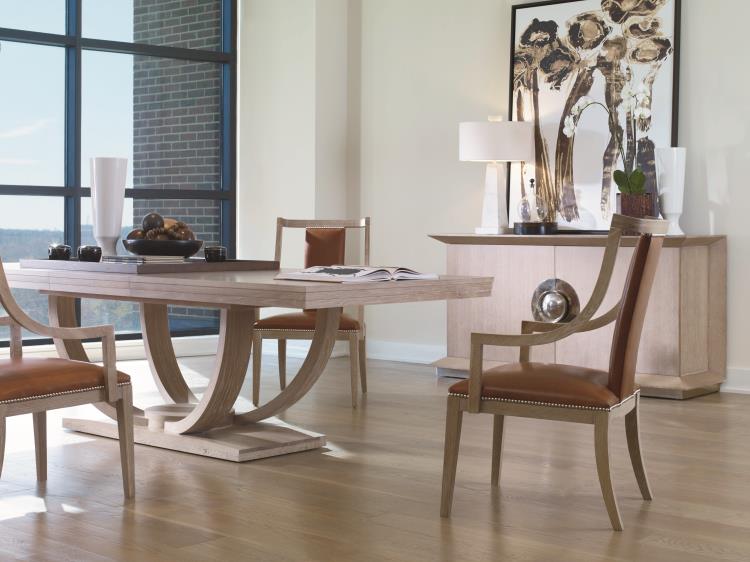 Modern dining room with a Century Furniture Omni Large Rectangular Dining Table in Blonde Cerused Oak, four leather chairs, a sideboard with lamps and decor, large artwork, and floor-to-ceiling windows.