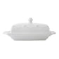 The Juliska Berry & Thread Classic Whitewash Butter Dish features a decorative lid with a small handle, shown against a plain background.