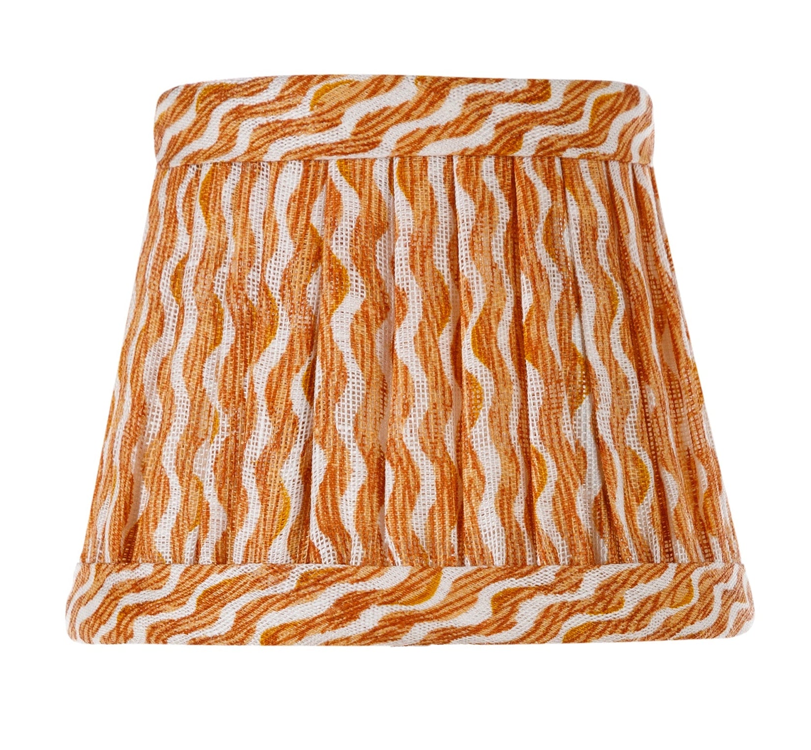 The Zafferano x Fermoie Poldina Lampshade Collection by Zafferano America features a hand-made orange and white wavy striped lampshade on a white lamp stand, shown against a plain white background.