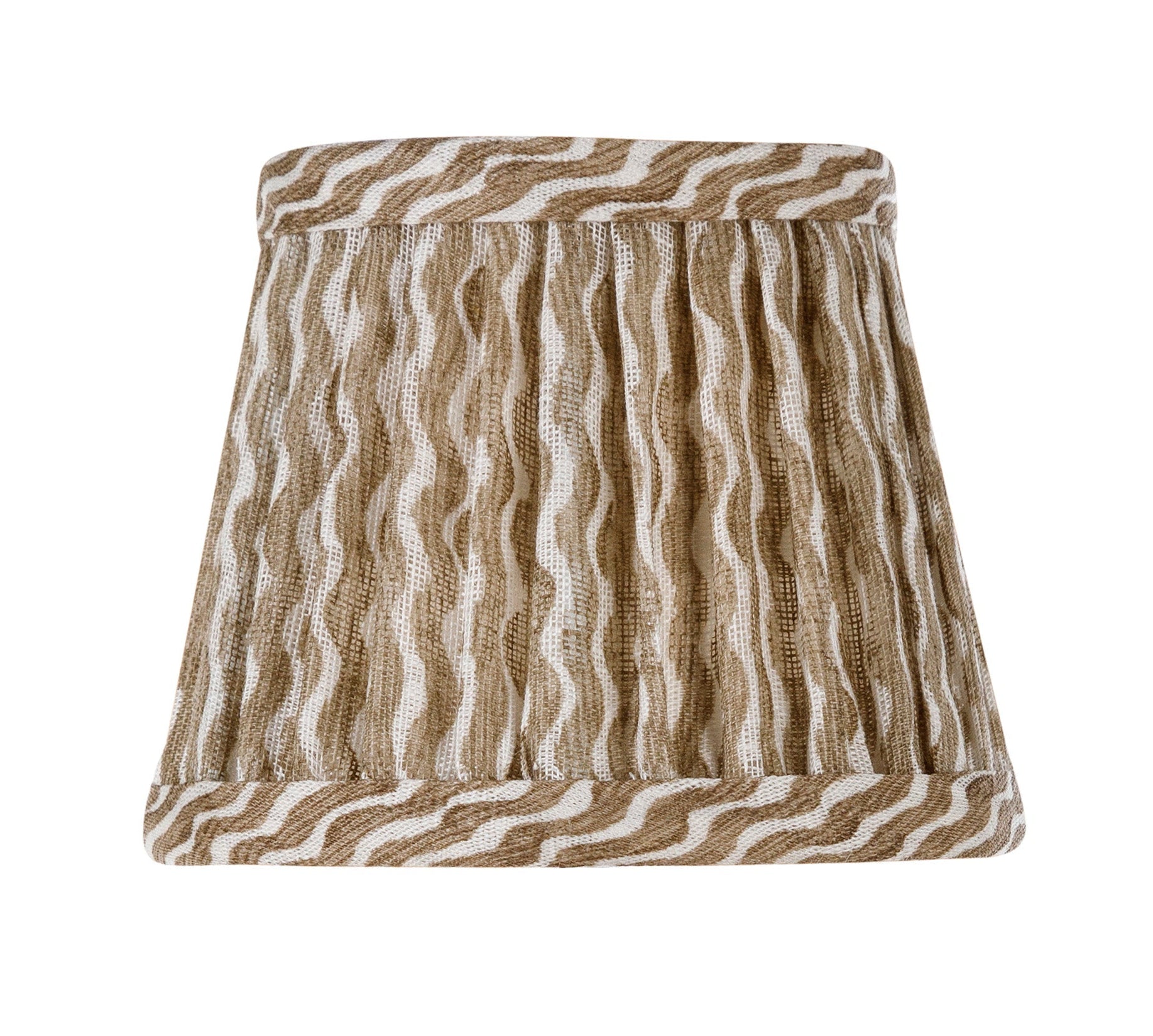 The Zafferano America x Fermoie Poldina Lampshade Collection features a hand-made, pleated lampshade in brown and white stripes, displayed against a white background.