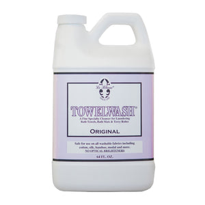 A 64 fl. oz. bottle of Le Blanc Towel Wash, a specialized cleaner perfect for organic fabrics like cotton, silk, and bamboo towels. This cleanser contains no optical brighteners and is ideal for absorbent towels.