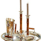 The ezrad Bamboo and Stainless Steel Decor Collection features a silver tray showcasing modern elegance with two bamboo candle holders and a hammered stainless steel pitcher with a wooden handle, all stylishly arranged.