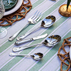 The Juliska Berry & Thread Polished Hostess Serving Set features five stainless steel pieces—spoons, a fork, and a knife—elegantly arranged, making it an ideal hostess gift or the perfect addition to your tableware collection.