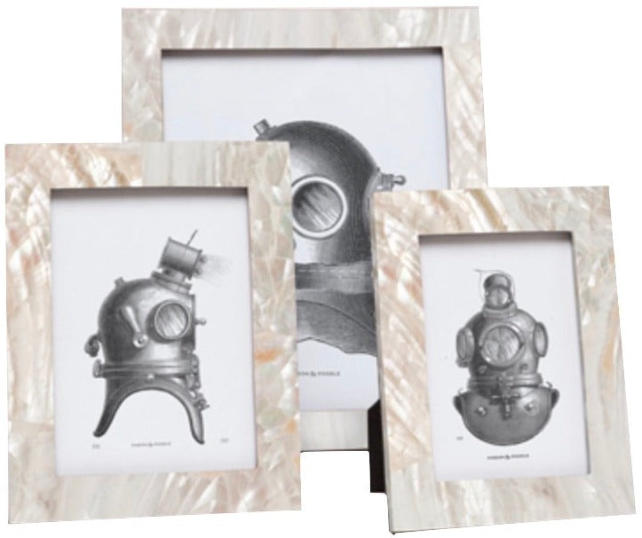 The Aurora Frame Collection by Pigeon & Poodle features three iridescent shell frames displaying black and white vintage diving helmet illustrations, bringing ocean-inspired elegance to your décor.