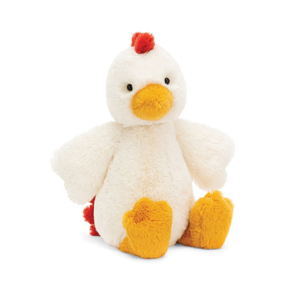 A Jellycat Bashful Chicken, a white stuffed animal with red feathers, sitting on a white background.