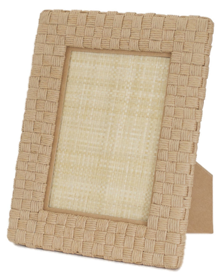 A standing Pigeon & Poodle Genova Frame Collection with a beige linen backing, featuring a crisscross pattern, displayed against a white background.